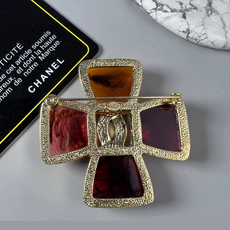 Ch*el brooches
